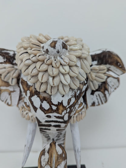 Élément décoratif éléphant coquillage sur socle
