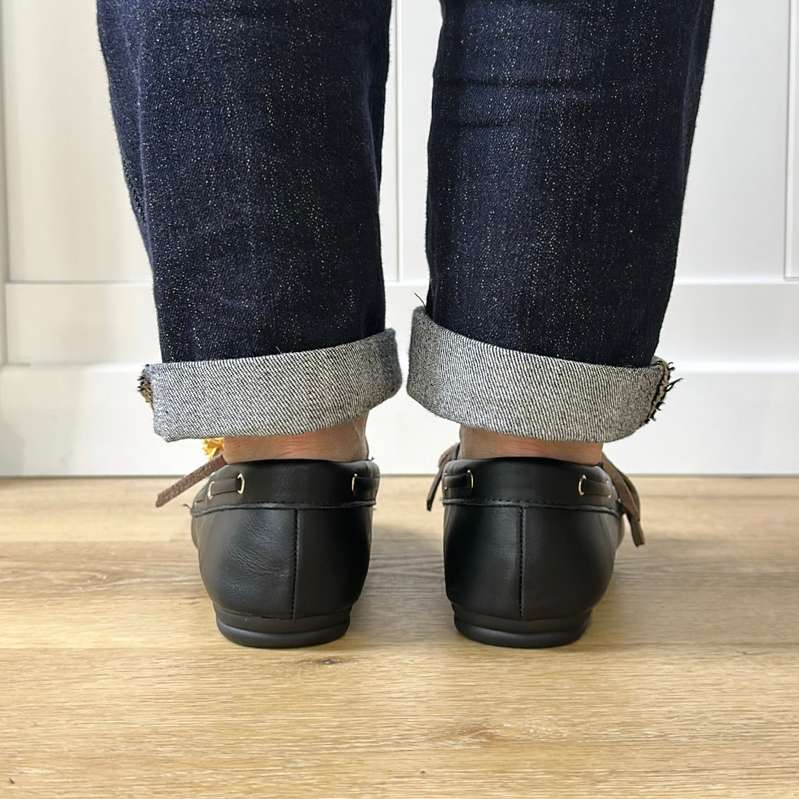Mocassins bateau revisités à pompons Noir