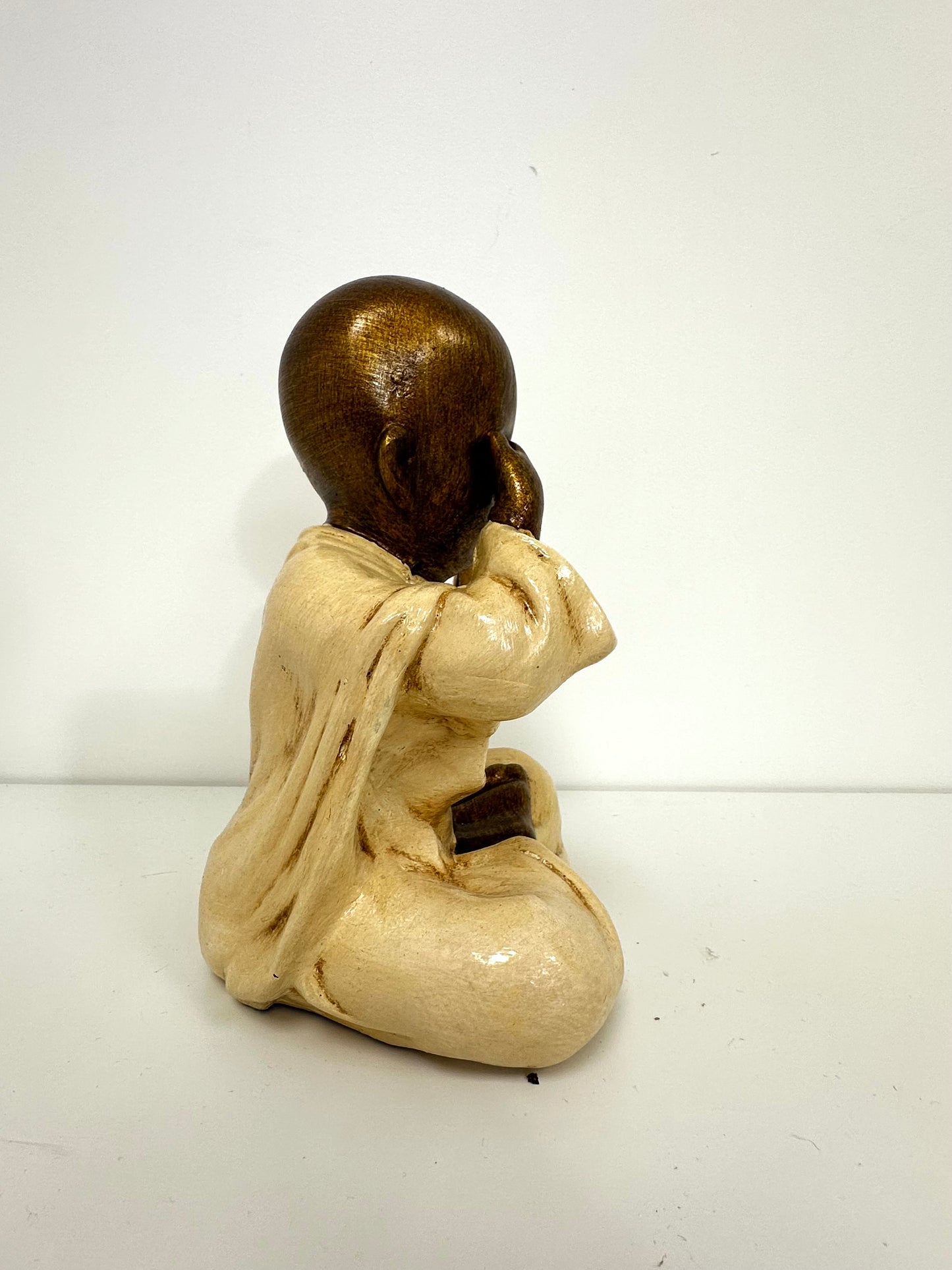 Statue moine “Main sur les yeux”